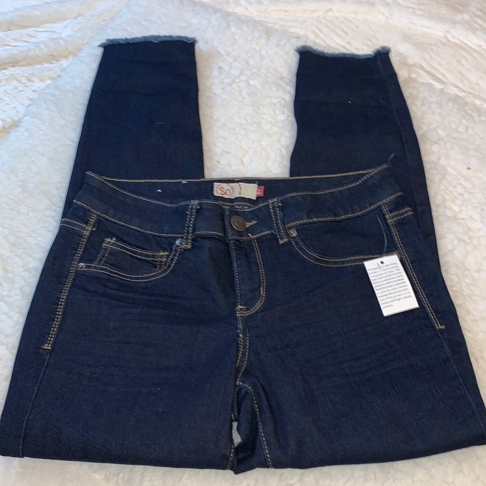 SO Ankle Jegging Jeans in Size 9 juniors. Dark Indigo with frayed hems. NWT.​